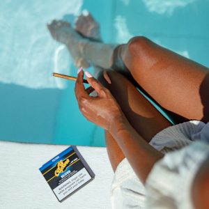 A set of pool party favors by the pool, adult pool party