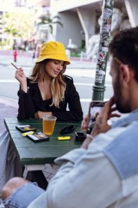 er Olympics Ideas: Legendary Games for Unforgettable Gatherings
Alt Text: Backyard Beer Olympics setup with teams in matching shirts, drinking games, coolers of drinks, and Al Capone cigarillos offered for adults